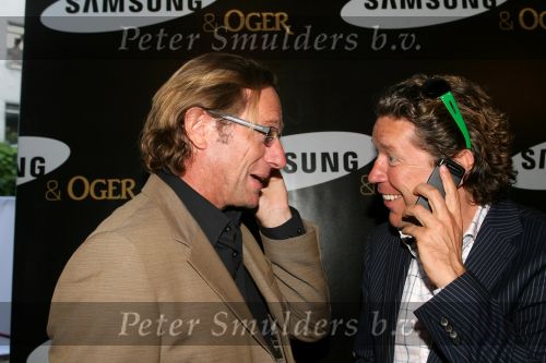 Amsterdam, 12 Juli 2006
Presentatie nieuw GSM Toestel type van Samsung X820 i.s.m. met Oger.  Henkjan Smits samen met Eric v Tijn