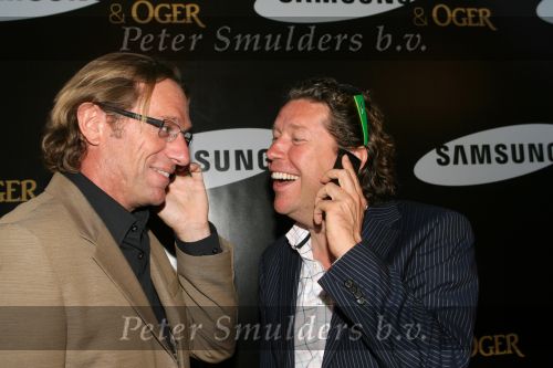 Amsterdam, 12 Juli 2006
Presentatie nieuw GSM Toestel type van Samsung X820 i.s.m. met Oger.  Henkjan Smits samen met Eric v Tijn