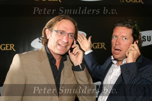 Amsterdam, 12 Juli 2006
Presentatie nieuw GSM Toestel type van Samsung X820 i.s.m. met Oger.  Henkjan Smits samen met Eric v Tijn