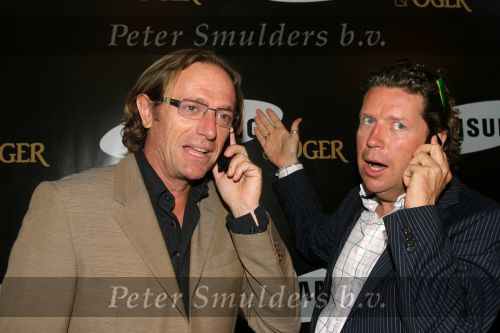 Amsterdam, 12 Juli 2006
Presentatie nieuw GSM Toestel type van Samsung X820 i.s.m. met Oger.  Henkjan Smits samen met Eric v Tijn
