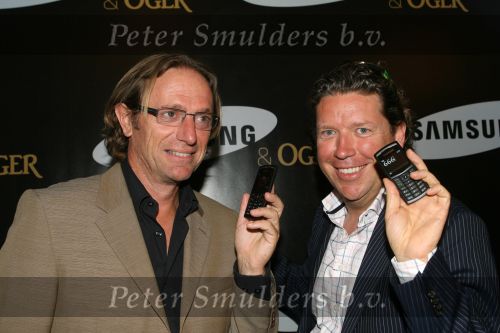 Amsterdam, 12 Juli 2006
Presentatie nieuw GSM Toestel type van Samsung X820 i.s.m. met Oger.  Henkjan Smits samen met Eric v Tijn