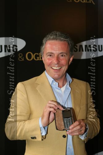 Amsterdam, 12 Juli 2006
Presentatie nieuw GSM Toestel type van Samsung X820 i.s.m. met Oger.  Huub Stapel