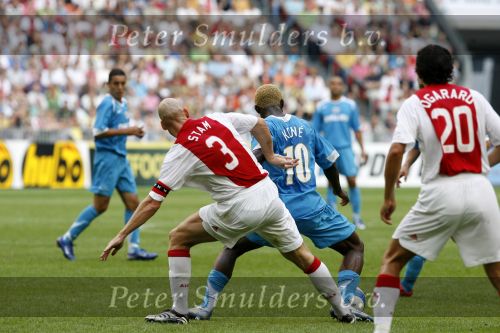 Amsterdam 13 augustus 2006
Ajax-PSV 3-1 om de johan Cruijff schaal in de arena.
jaap Stam en Kone
Peter Smulders bv