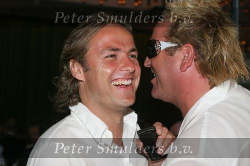 Amsterdam, 12 Juli 2006
Presentatie nieuw GSM Toestel type van Samsung X820 i.s.m. met Oger.  John Ewbank in gesprek met Gordon