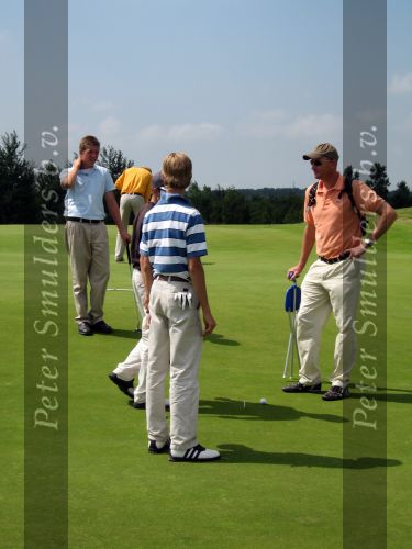 Halfweg, 5 Augustus 2006
Tweede ronde NK Strokeplay Heren op golfbaan 
Junior Smulders en zijn coach Joost Steenkamer