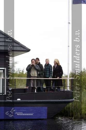 Muiderberg 31 mei 2006
Linda de Mol, Annette Malherbe Tjitske Reidinga  en Susan Visser  (Gooische vrouwen)op woonark in natuurreservaat Naardermeer tegen aanleg A6
Peter Smulders bv
