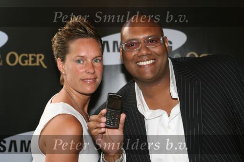 Amsterdam, 12 Juli 2006
Presentatie nieuw GSM Toestel type van Samsung X820 i.s.m. met Oger.  Mark Dakriet ( ex Direct ) met zijn vriendin