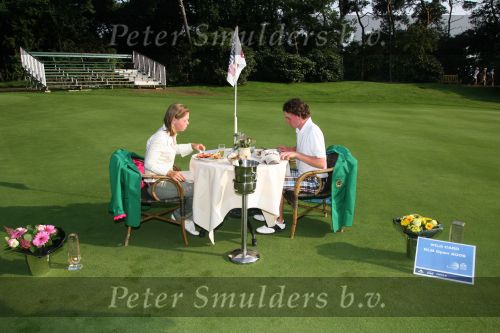 Molenschot, 22 Juli 2006
Golfclub Toxandria, Internationaal Golftoernooi Riverwoods 
Tim Sluiter en Christel Boeljon samen op de green van 18 voor de traditionele lunch voor de winnaars