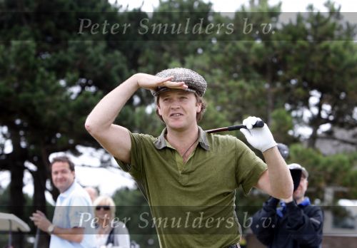 Zandvoort 18 augustus 2007
Beau v Erven Dorens met korte broek en pet golfend  tijdens Charity challenge tijdens KLM open.