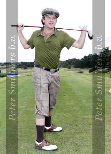 Zandvoort 18 augustus 2007
Beau v Erven Dorens met korte broek en pet golfend  tijdens Charity challenge tijdens KLM open.