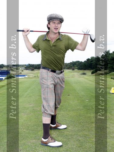 Zandvoort 18 augustus 2007
Beau v Erven Dorens met korte broek en pet golfend  tijdens Charity challenge tijdens KLM open.