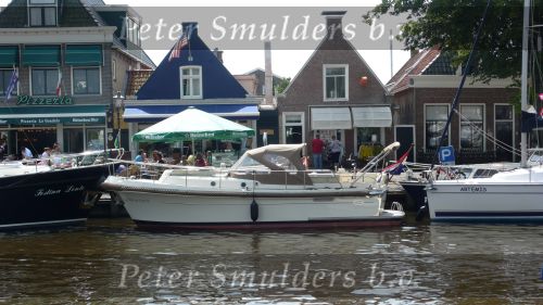 Lemmer, 31 Juli 2007
Lemmer Week Kermis, doortocht van de skutsje zeilboten en andere boten door het centrum voor 2 wedstrijddagen, Haven, Sluis Intercruiser 29