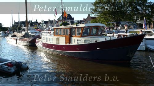 Lemmer, 31 Juli 2007
Lemmer Week Kermis, doortocht van de skutsje zeilboten en andere boten door het centrum voor 2 wedstrijddagen, Haven, Sluis