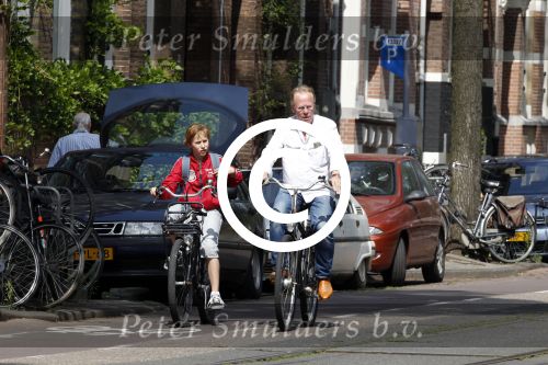 Amsterdam 5 juni 2011
Jack Spijkerman met zoon op fiets.
Peter Smulders bv