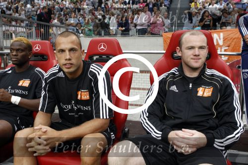 Amsterdam 3 augustus 2011
Afscheidswedstrijd Edwin v d Sar in Arena . Johnny Heitinga met Wayne Rooney
Peter Smulders bv