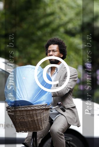 Amsterdam 20 juli 2011
Acteur Mike Libanon op de fiets.
Peter Smulders bv