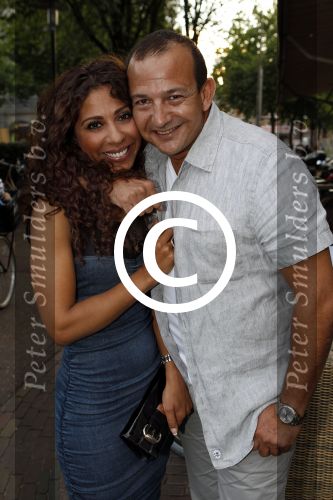 Amsterdam 7 juli 2011
Najib Amhali met zijn nieuwe vriendin Niama.
Peter Smulders bv