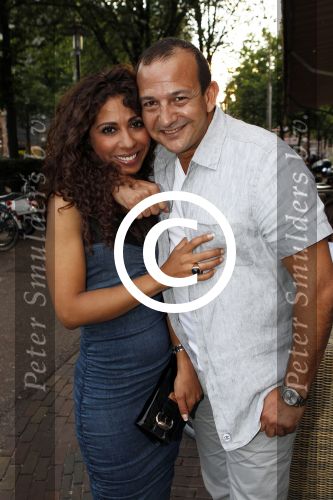 Amsterdam 7 juli 2011
Najib Amhali met zijn nieuwe vriendin Niama.
Peter Smulders bv