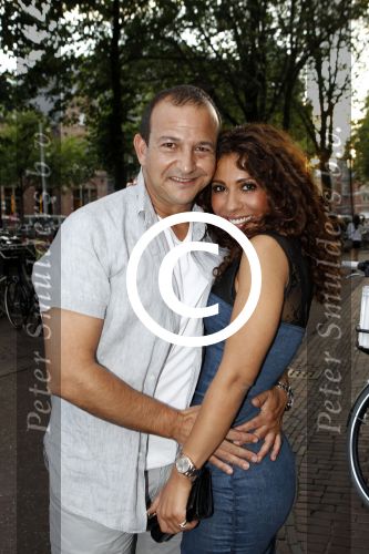 Amsterdam 7 juli 2011
Najib Amhali met zijn nieuwe vriendin Niama.
Peter Smulders bv
