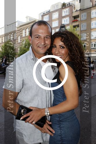 Amsterdam 7 juli 2011
Najib Amhali met zijn nieuwe vriendin Niama.
Peter Smulders bv