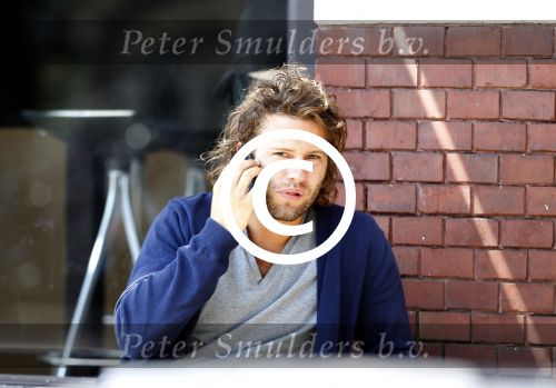 Amsterdam 15 juli 2011
Sascha Visser eet broodje.
Peter Smulders vc