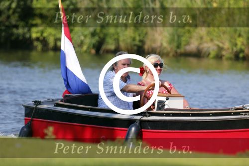 Vreeland 25 juli 2012
Maarten Spanjer met vriendin en Rene v d Gijp met vriendin aan het varen op de Vecht met sloep/boot Maarten.
Peter Smulders bv