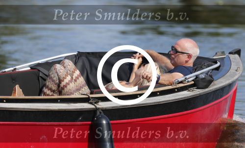 Vreeland 25 juli 2012
Maarten Spanjer met vriendin en Rene v d Gijp met vriendin aan het varen op de Vecht met sloep/boot Maarten.
Peter Smulders bv