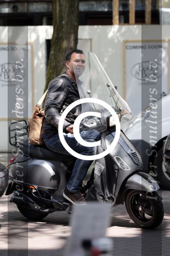 Amsterdam 26 juni 2012
Ruud Gullit op zijn vespa scooter.
Peter Smulders bv