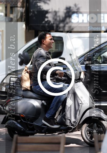 Amsterdam 26 juni 2012
Ruud Gullit op zijn vespa scooter.
Peter Smulders bv