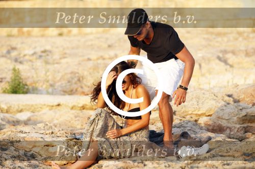 Ibiza 10 juli 2012
Wesley Sneijder en zijn vrouw Yolanthe Sneijder Cabau verliefd op ibiza genieten van de ondergaande zon.
Peter Smulders bv