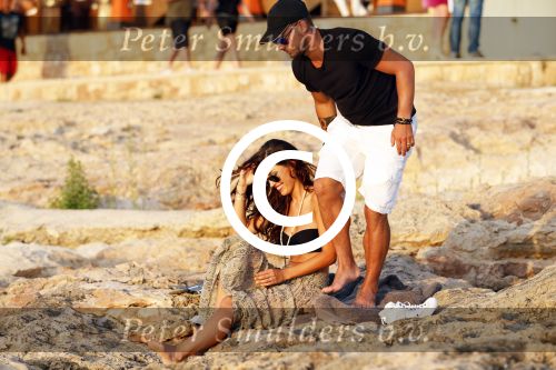 Ibiza 10 juli 2012
Wesley Sneijder en zijn vrouw Yolanthe Sneijder Cabau verliefd op ibiza genieten van de ondergaande zon.
Peter Smulders bv