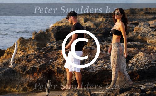 Ibiza 10 juli 2012
Wesley Sneijder en zijn vrouw Yolanthe Sneijder Cabau verliefd op ibiza genieten van de ondergaande zon.
Peter Smulders bv