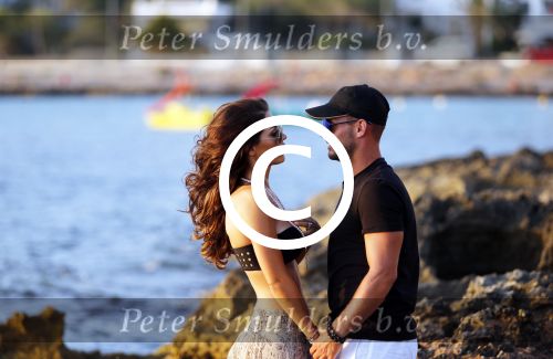 Ibiza 10 juli 2012
Wesley Sneijder en zijn vrouw Yolanthe Sneijder Cabau verliefd op ibiza genieten van de ondergaande zon.
Peter Smulders bv