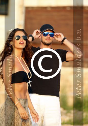 Ibiza 10 juli 2012
Wesley Sneijder en zijn vrouw Yolanthe Sneijder Cabau verliefd op ibiza genieten van de ondergaande zon.
Peter Smulders bv