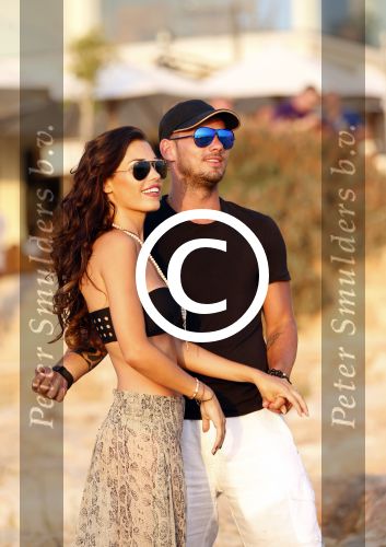 Ibiza 10 juli 2012
Wesley Sneijder en zijn vrouw Yolanthe Sneijder Cabau verliefd op ibiza genieten van de ondergaande zon.
Peter Smulders bv