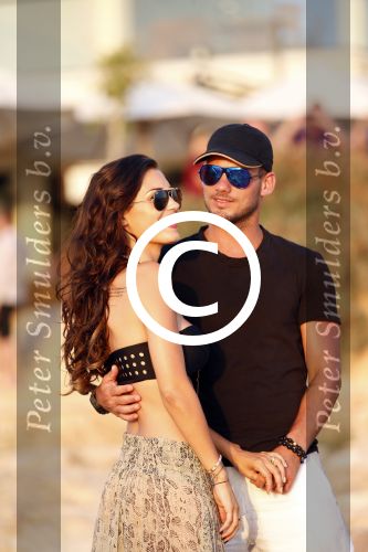 Ibiza 10 juli 2012
Wesley Sneijder en zijn vrouw Yolanthe Sneijder Cabau verliefd op ibiza genieten van de ondergaande zon.
Peter Smulders bv