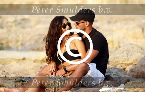 Ibiza 10 juli 2012
Wesley Sneijder en zijn vrouw Yolanthe Sneijder Cabau verliefd op ibiza genieten van de ondergaande zon.
Peter Smulders bv