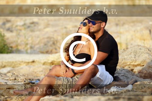 Ibiza 10 juli 2012
Wesley Sneijder en zijn vrouw Yolanthe Sneijder Cabau verliefd op ibiza genieten van de ondergaande zon.
Peter Smulders bv