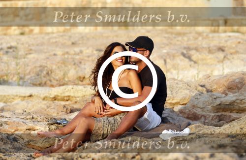 Ibiza 10 juli 2012
Wesley Sneijder en zijn vrouw Yolanthe Sneijder Cabau verliefd op ibiza genieten van de ondergaande zon.
Peter Smulders bv