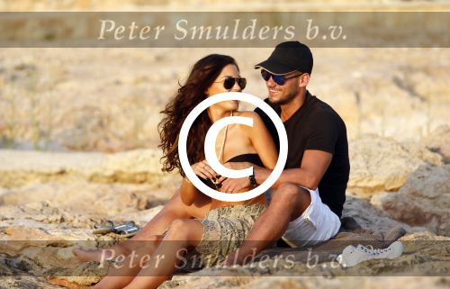Ibiza 10 juli 2012
Wesley Sneijder en zijn vrouw Yolanthe Sneijder Cabau verliefd op ibiza genieten van de ondergaande zon.
Peter Smulders bv