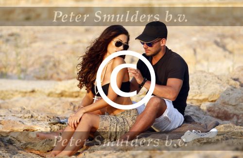 Ibiza 10 juli 2012
Wesley Sneijder en zijn vrouw Yolanthe Sneijder Cabau verliefd op ibiza genieten van de ondergaande zon.
Peter Smulders bv