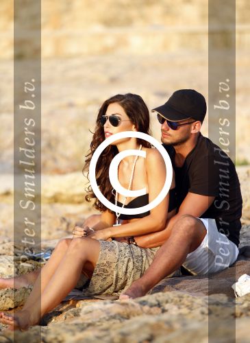 Ibiza 10 juli 2012
Wesley Sneijder en zijn vrouw Yolanthe Sneijder Cabau verliefd op ibiza genieten van de ondergaande zon.
Peter Smulders bv