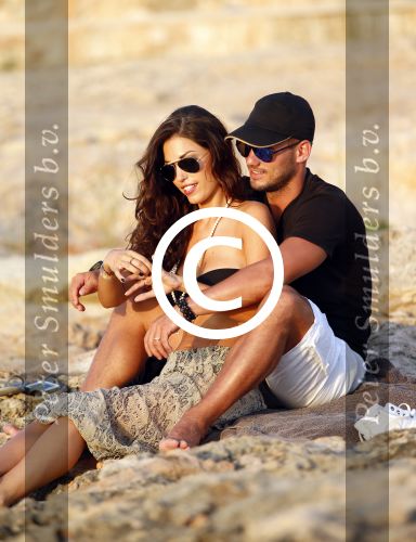 Ibiza 10 juli 2012
Wesley Sneijder en zijn vrouw Yolanthe Sneijder Cabau verliefd op ibiza genieten van de ondergaande zon.
Peter Smulders bv