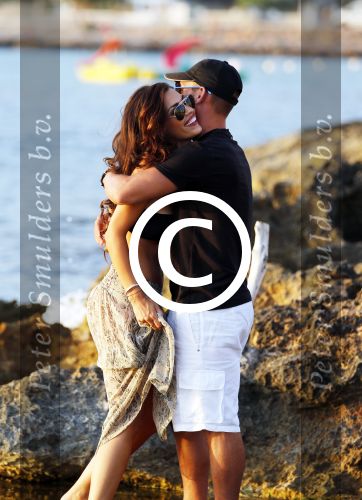 Ibiza 10 juli 2012
Wesley Sneijder en zijn vrouw Yolanthe Sneijder Cabau verliefd op ibiza genieten van de ondergaande zon.
Peter Smulders bv