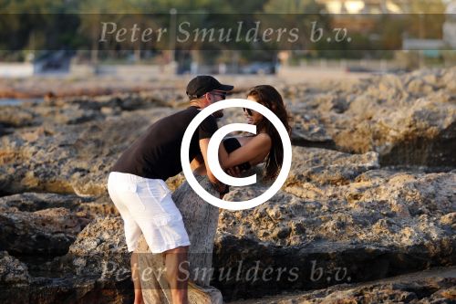 Ibiza 10 juli 2012
Wesley Sneijder en zijn vrouw Yolanthe Sneijder Cabau verliefd op ibiza genieten van de ondergaande zon.
Peter Smulders bv
