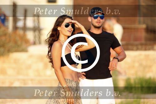 Ibiza 10 juli 2012
Wesley Sneijder en zijn vrouw Yolanthe Sneijder Cabau verliefd op ibiza genieten van de ondergaande zon.
Peter Smulders bv