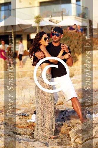 Ibiza 10 juli 2012
Wesley Sneijder en zijn vrouw Yolanthe Sneijder Cabau verliefd op ibiza genieten van de ondergaande zon.
Peter Smulders bv