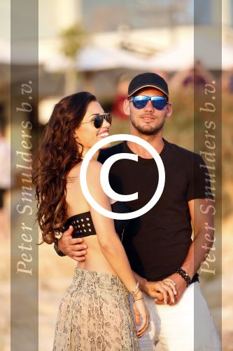 Ibiza 10 juli 2012
Wesley Sneijder en zijn vrouw Yolanthe Sneijder Cabau verliefd op ibiza genieten van de ondergaande zon.
Peter Smulders bv