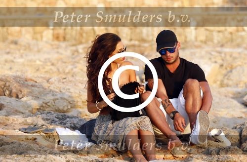 Ibiza 10 juli 2012
Wesley Sneijder en zijn vrouw Yolanthe Sneijder Cabau verliefd op ibiza genieten van de ondergaande zon.
Peter Smulders bv