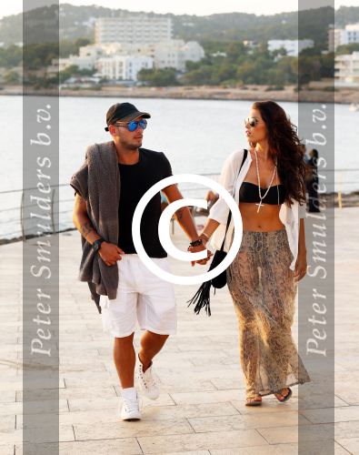 Ibiza 10 juli 2012
Wesley Sneijder en zijn vrouw Yolanthe Sneijder Cabau verliefd op ibiza genieten van de ondergaande zon.
Peter Smulders bv